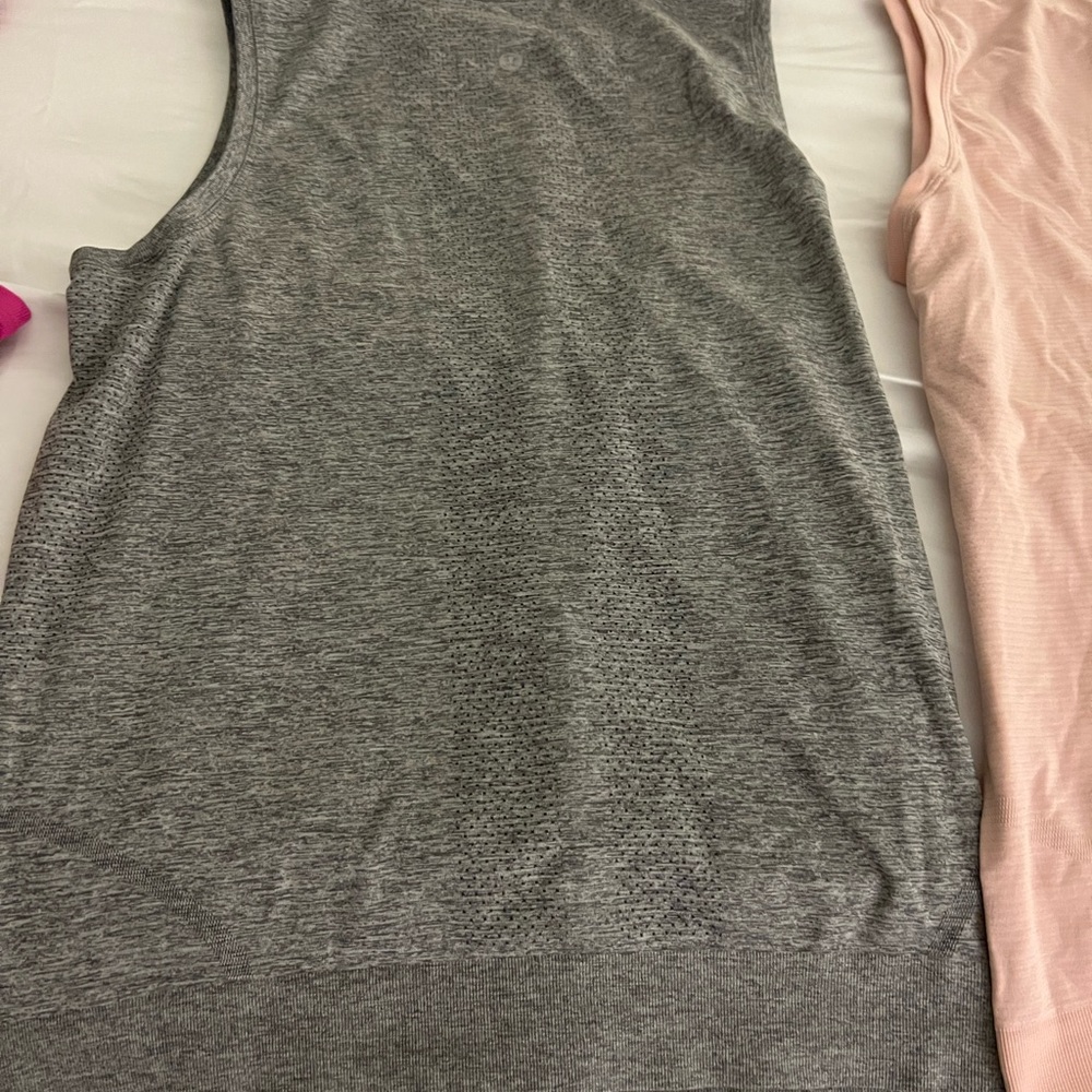 3 muscle no sleeve lululemon tops 20$ each/ 3 for $55